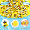 A close-up view of a large pile of yellow mini resin cruise ducks with sunglasses