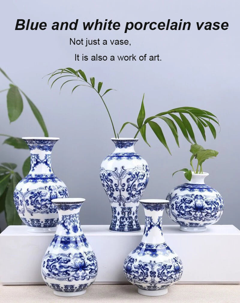 A collection of blue and white porcelain vases featuring intricate floral patterns displayed on a white surface.