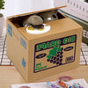 A cardboard box containing a small gray panda figurine and a coin-saving mechanism.
