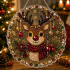 A round clear acrylic ornament featuring a deer head design adorned with red and gold pearls and glitter.