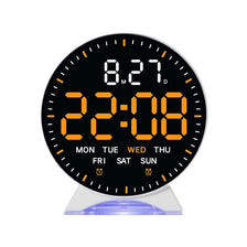 A digital alarm clock displaying 22:08 with an 8.27 jump display on a black round screen.