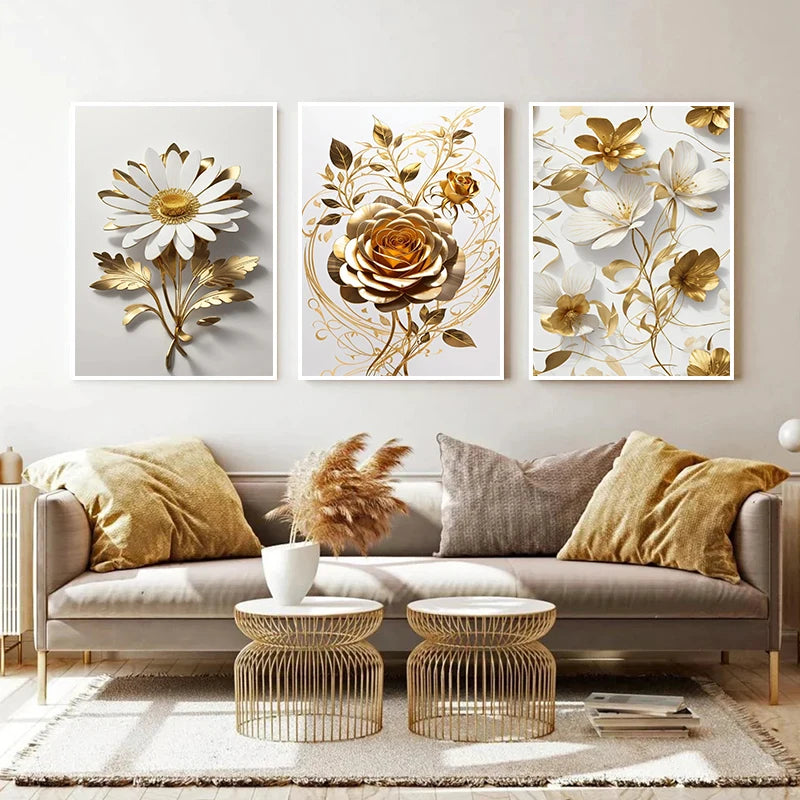 Tres impresiones en lienzo enmarcadas con diseños florales de girasoles dorados y blancos, exhibidas en un sofá gris claro.