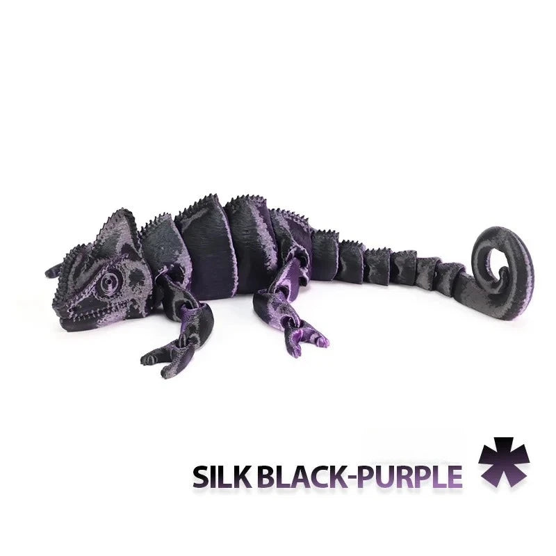 A black and purple articulated dragon lizard figurine.