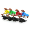 Five miniature witch and wizard figures in various colors are displayed on a black dashboard drift decor.