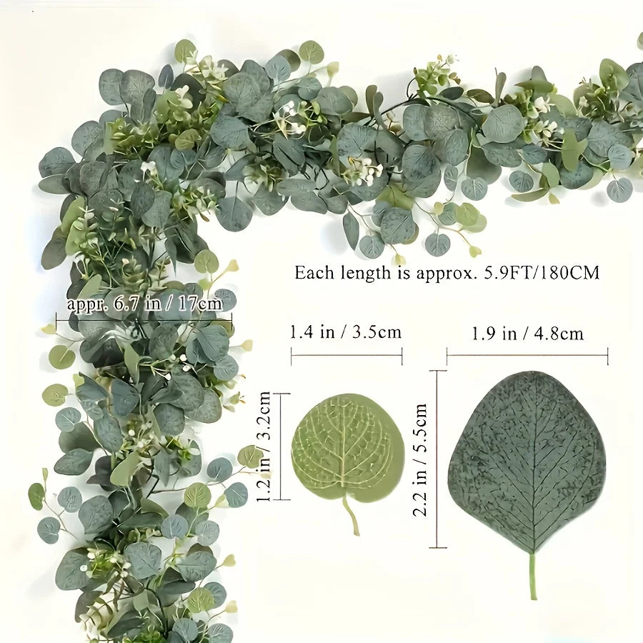 Green artificial eucalyptus garland featuring small white flowers and various leaf shapes.