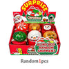 A box of Christmas mystery blind box containing various squishy fidget toys including a snowman, elk, and Santa Claus figures