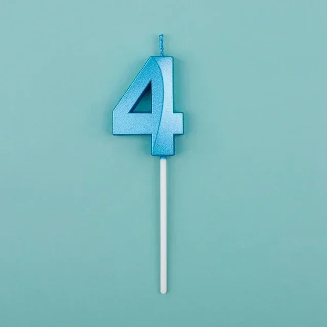 A blue number four candle with a white stick against a light teal background.