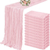 A set of ten terracotta semi-sheer cheesecloth table runners in a dusty pink color.