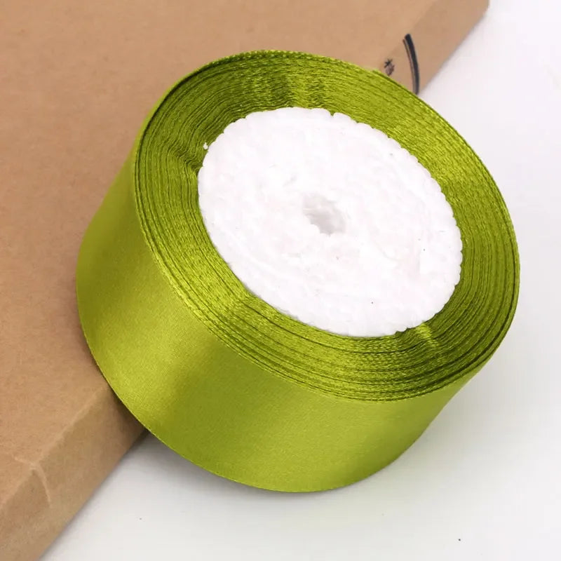 Roll of lime green satin ribbon for crafts and gift wrapping