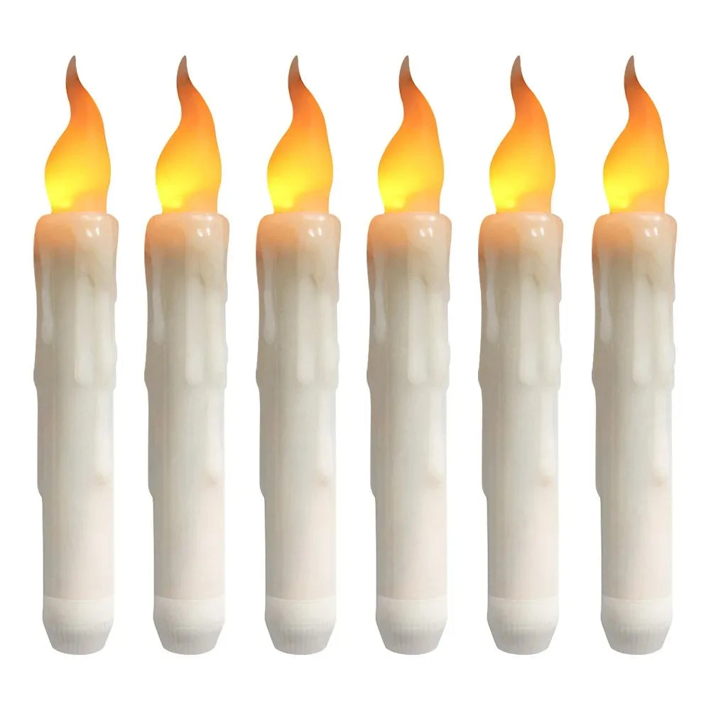 A set of five white taper candles with yellow flames, used for flameless LED candles.