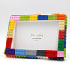 A colorful building block frame kit with a white interior, designed for creating a photo frame.