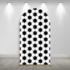 A black and white honeycomb pattern arch backdrop cover for a photo booth