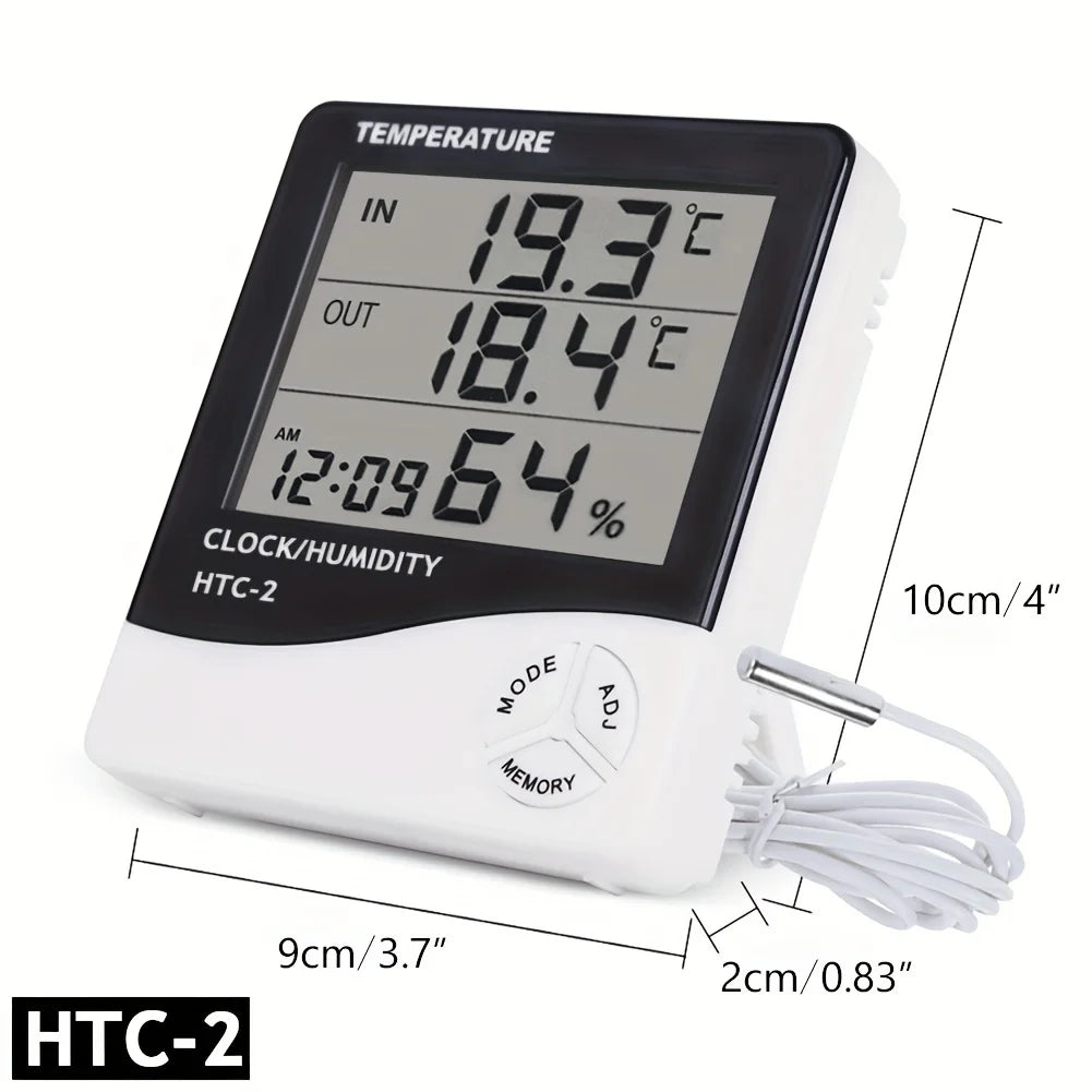 A white LED digital thermometer and hygrometer with an alarm clock display showing temperature, humidity, and time.