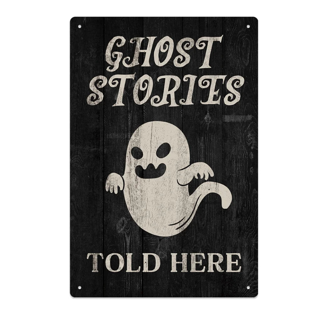 A dark wooden sign with white text that reads Ghost Stories and Told Here, featuring a white ghost graphic.