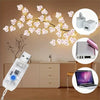 LED rattan string lights for seasonal decor displayed with related components and a laptop.