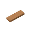 A rectangular building brick tile in a brown color shown at an angle.