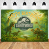 A vibrant green dinosaur theme birthday backdrop banner featuring various dinosaurs and jungle foliage.