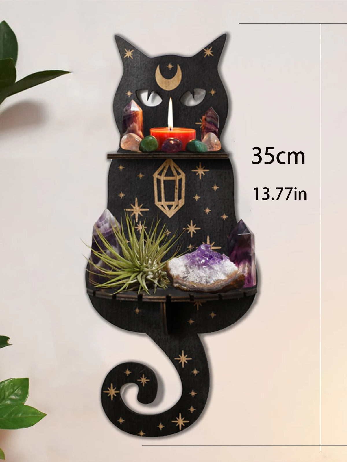 A black cat silhouette floating shelf featuring a moon, crystals, and decor for display.