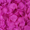 A close-up view of vibrant magenta silk rose petals used for weddings, parties, and home decor.