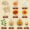 A set of golden palm leaf cake toppers featuring various floral and leaf designs in different sizes.