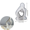 A translucent silicone mold shaped like a stylized human figure for resin art and crafting.