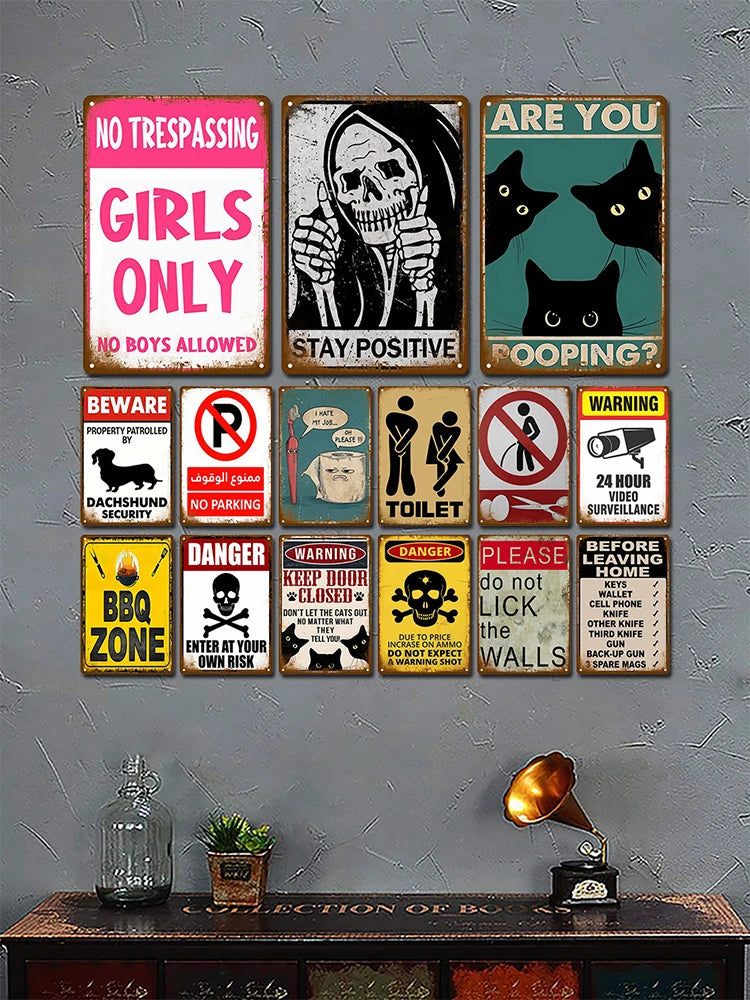A collection of vintage humorous tin signs featuring warnings and jokes for a man cave or bar setting.