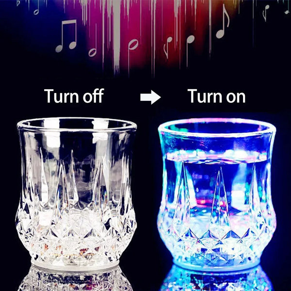 A clear glass party cup glowing with vibrant blue light, demonstrating a turn on effect.