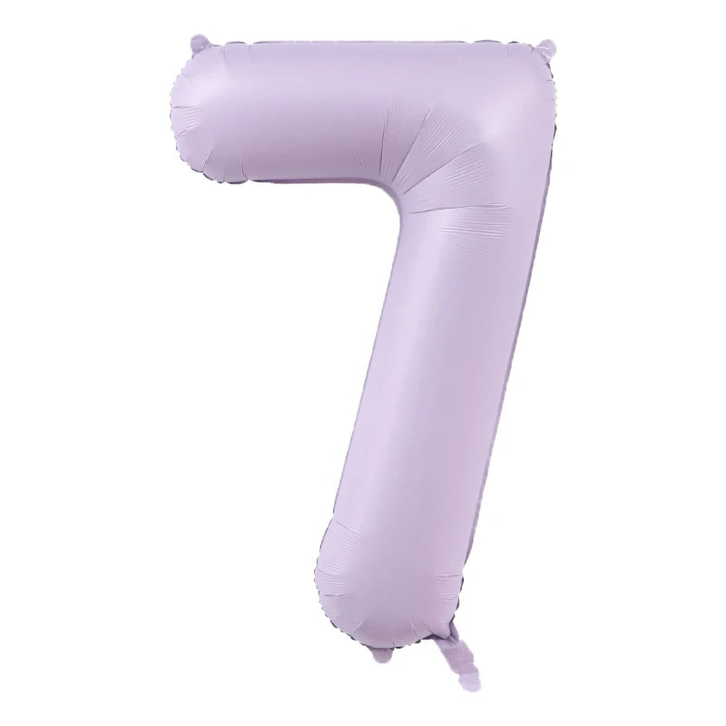 A purple foil number balloon shaped like the numeral 7.