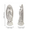 A white resin statue of Our Lady of Guadalupe with a halo and draped robes.