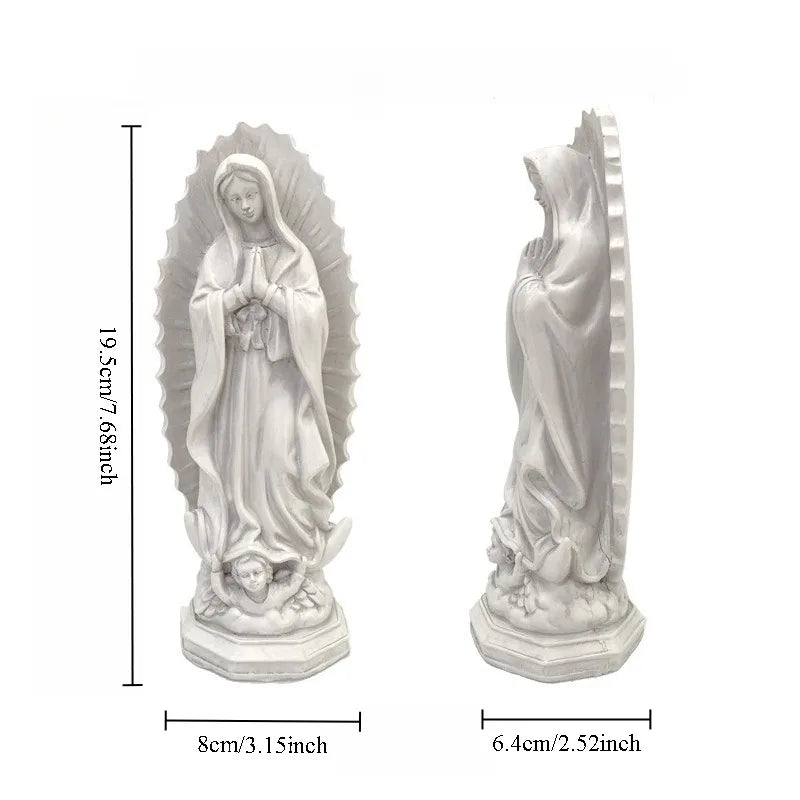A white resin statue of Our Lady of Guadalupe with a halo and draped robes.