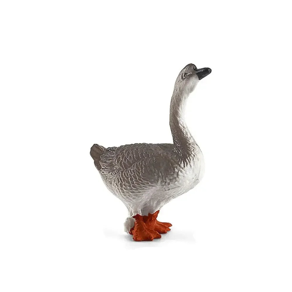 A realistic figurine of a goose with gray feathers and orange legs.