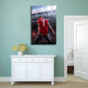 A canvas wall art poster featuring Cristiano Ronaldo in a red jersey against a dark background.