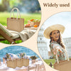 A woman holds a natural jute tote bag with cotton rope handles outdoors against a backdrop of a historic building.