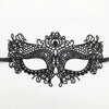 Elegant black lace half face mask with intricate floral and scrollwork design