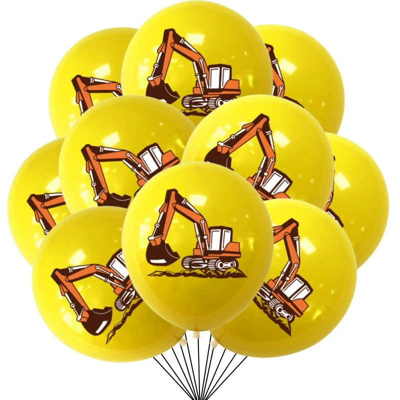 A bunch of yellow latex balloons featuring orange construction equipment like excavators and bulldozers.