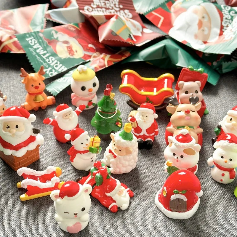 A collection of festive Santa Claus and snowman figurines for Christmas decor arranged on a dark surface.