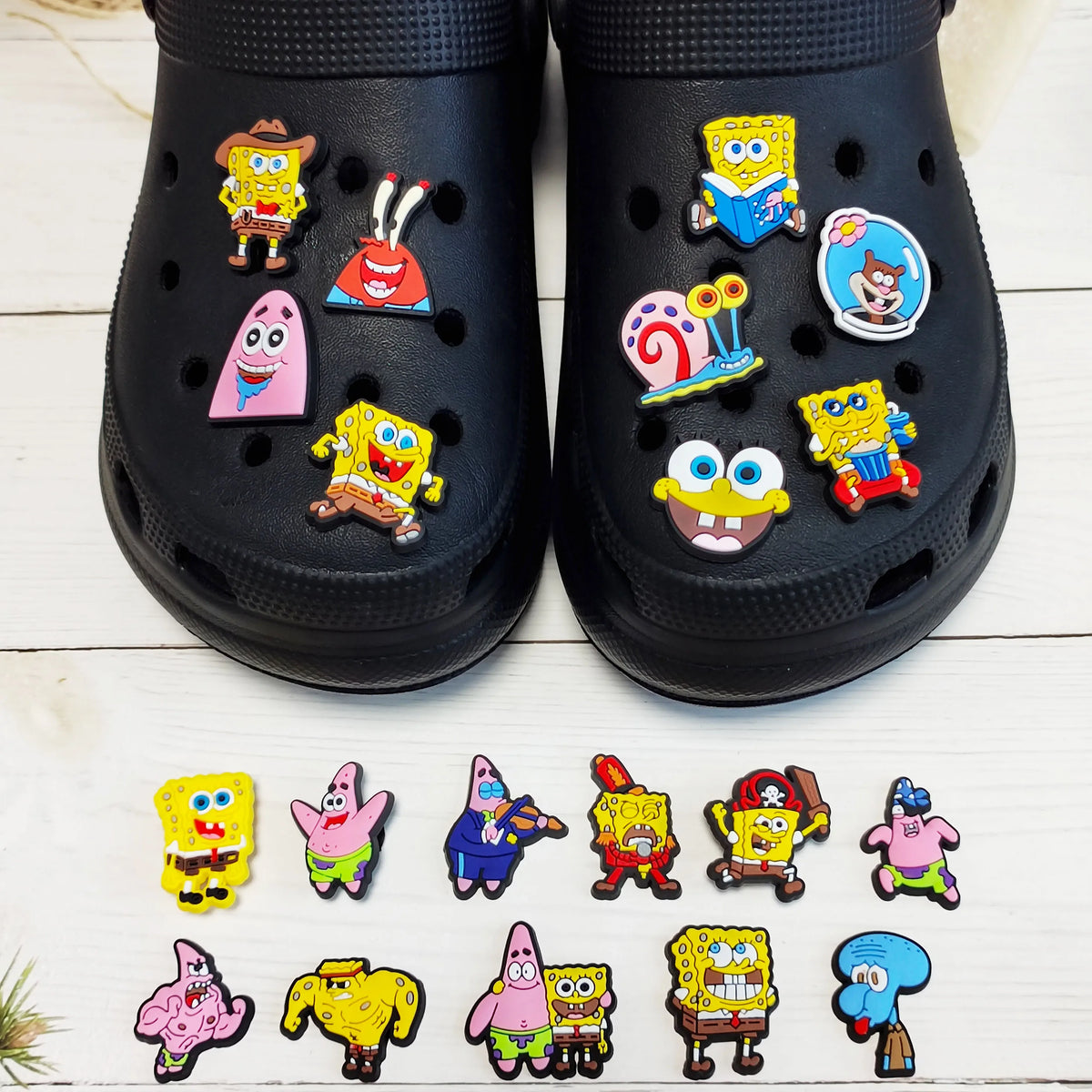 A collection of SpongeBob SquarePants themed shoe charms featuring characters like SpongeBob, Patrick, and Squidward.