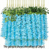 A dense cascade of light blue artificial wisteria flowers and green leaves hanging down.