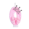 Pink princess crown candle with a bow for a birthday cake topper