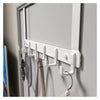 White heavy duty aluminum door hooks mounted on a wall, used for hanging items.
