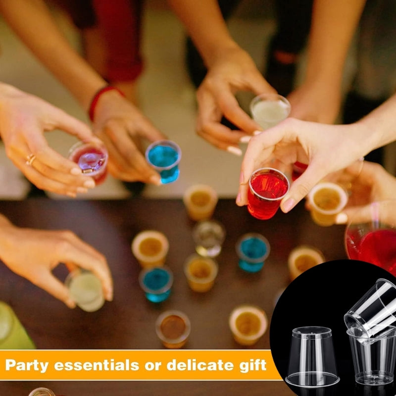 Hands are holding and pouring colorful liquid into reusable plastic shot glasses for a party or gift.