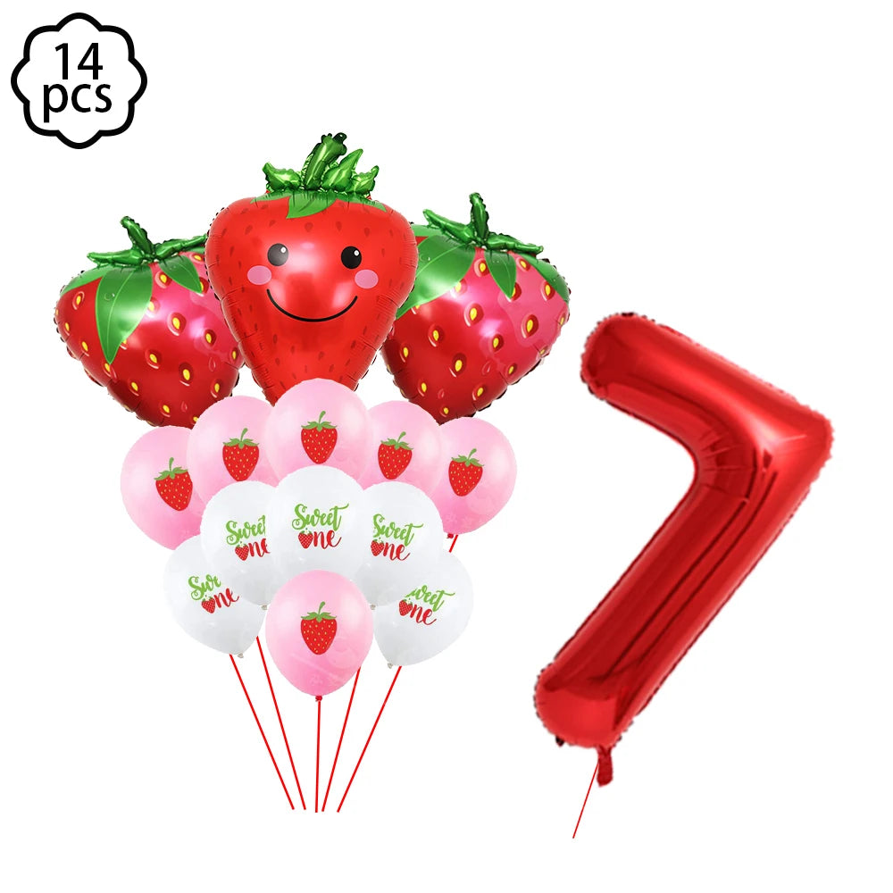 A kit of 14 strawberry-themed party supplies including strawberries, plates, cups, napkins, and a tablecloth.