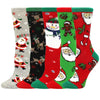 A stack of five Christmas women's socks featuring reindeer, trees, and festive holiday patterns in various colors.