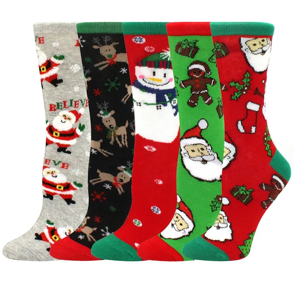 A stack of five Christmas women's socks featuring reindeer, trees, and festive holiday patterns in various colors.