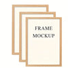 Mockup of three light wood-framed photo frames with white mats.