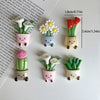A set of kawaii potted plant fridge magnets featuring various flowers and leaves in pastel colors.
