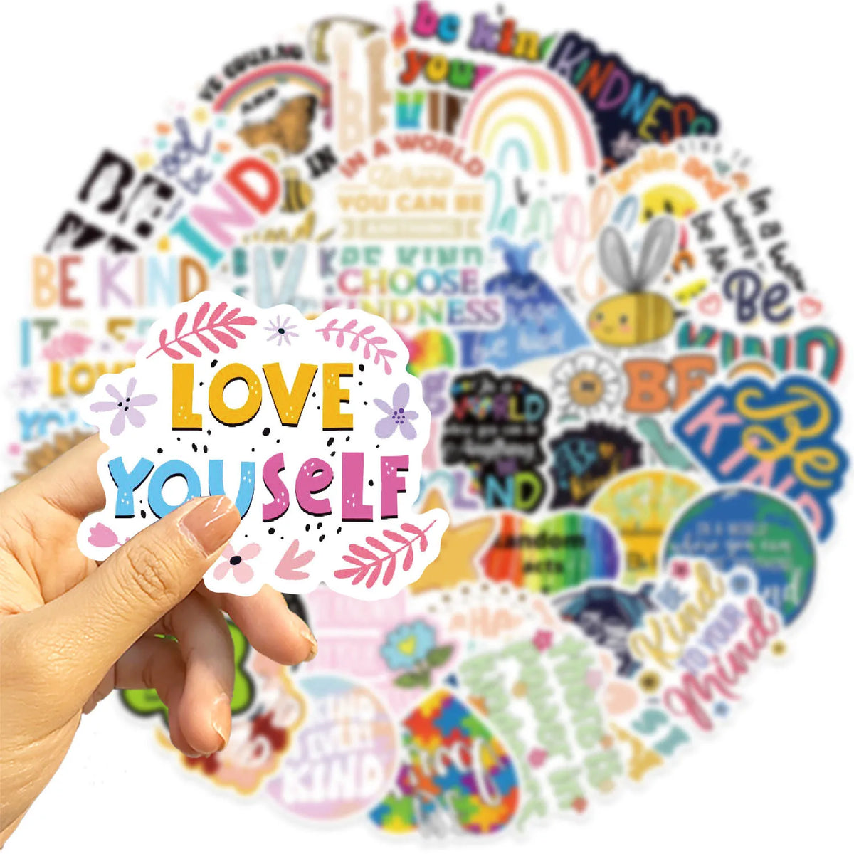 A hand is touching a colorful circular graphic made of inspirational words and designs.