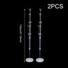 Two elegant balloon column stands with long metal rods and round bases.