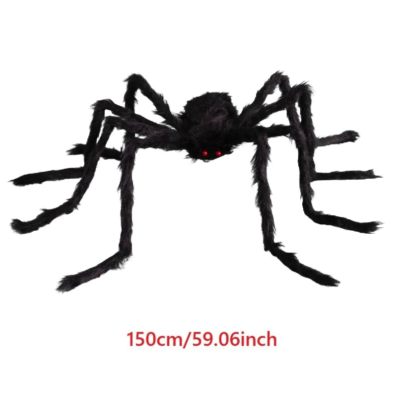 A large, black plush spider decoration with bright red eyes.