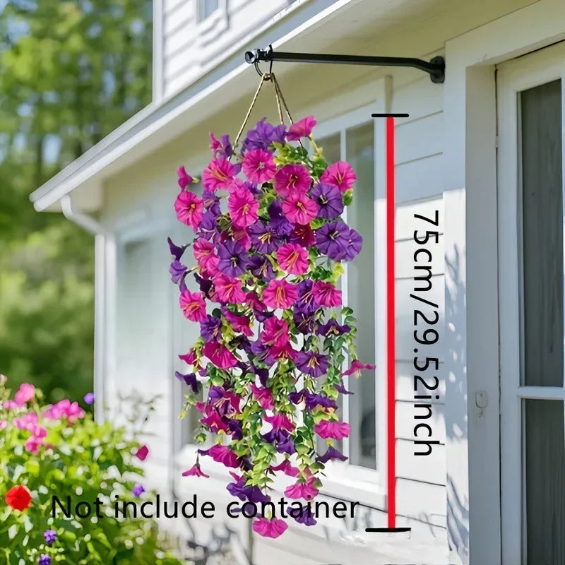 A purple and pink artificial morning glory garland hanging on a white door frame.